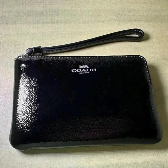 Coach Handbags - COACH Corner Zip Wristlet black patent leather with silver NWT
